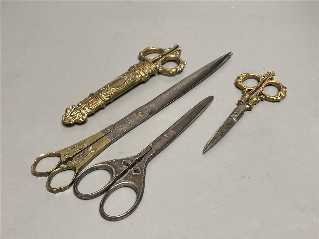 A pair of 18th/19th century Ottoman brass and steel calligraphers scissors with engraved decoration and three other pairs of scissors